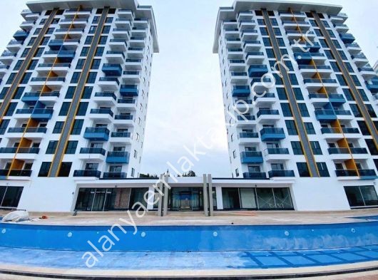 ALANYA MAHMUTLAR EXODUS HILL SİTESİNDE SATILIK EŞYALI 2+1 LÜKS DAİRE
