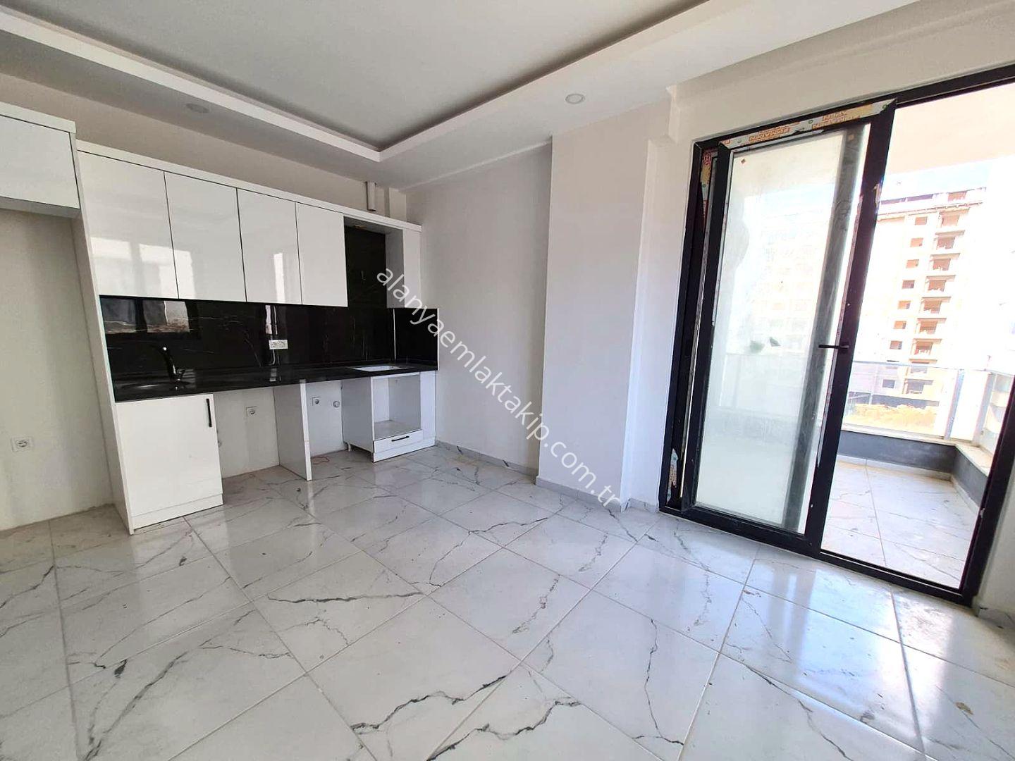 ALANYA MAHMUTLAR MAHALLESİ'NDE KİRALIK SIFIR 1+1 DAİRE